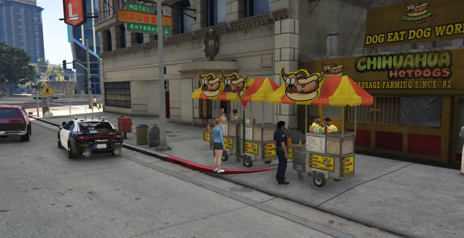 A quiet check-in at the Chihuahua Hotdogs cart, Downtown.
